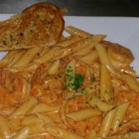 Rigatoni Ala Vodka · Tossed in our homemade pink vodka sauce.