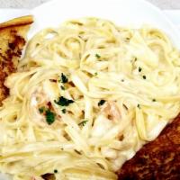 Fettuccine Alfredo · Tossed with our homemade alfredo sauce.