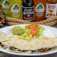 Quesadilla Regular · Large flour tortilla stuffed with your choice of meat and cheese. Served with sour cream, gu...