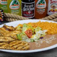 Chicken Breast Plate · Grilled chicken breast. Served with rice, beans, green salad and tortillas.