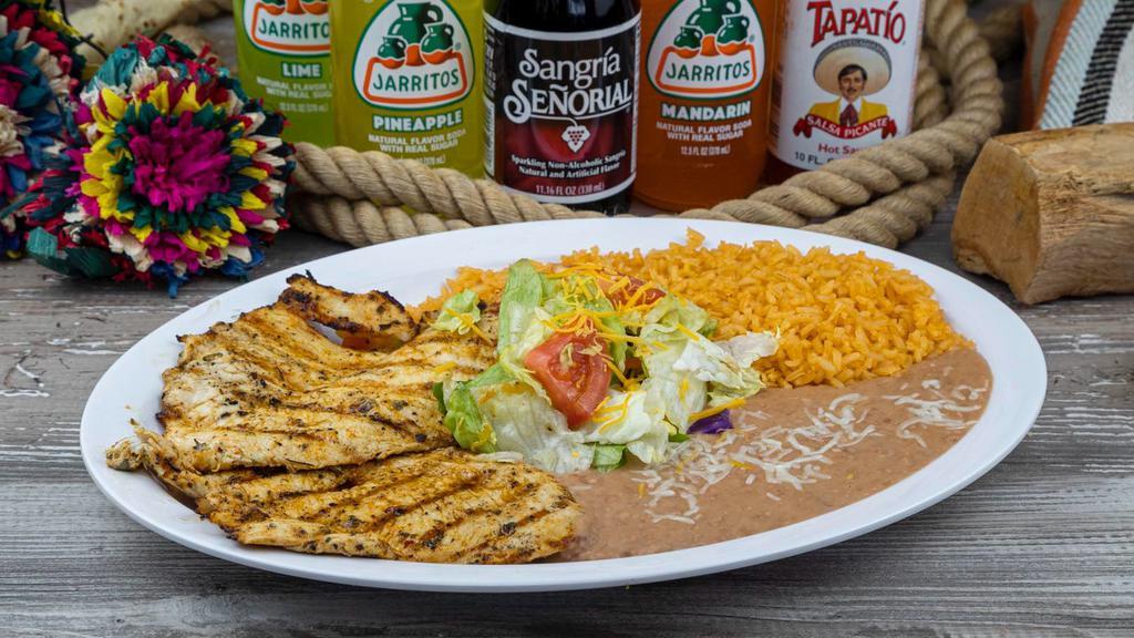 Chicken Breast Plate · Grilled chicken breast. Served with rice, beans, green salad and tortillas.