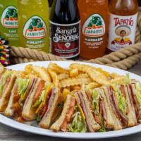 Club Sandwich · White bread with ham, bacon, mayonnaise, lettuce, tomato and cheese. Served with french fries.