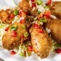 Crispy Peppery Chicken Wings · Hot and spicy.