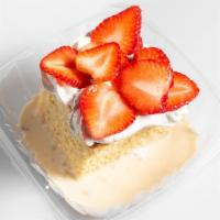 Tres Leches · Three milks cake is soaked in three milks forming a puddle at the bottom. It is topped with ...
