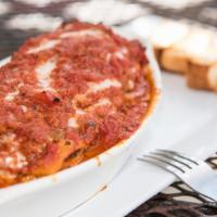 Lasagna Al Forno · Layers of pasta, ricotta cheese, marinara, ground beef and topped with melted mozzarella .