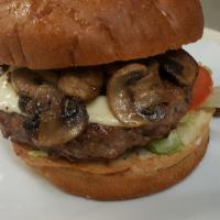 Mushroom Swiss Burger · Our ½ Lb burger served with mayo, lettuce, tomato, sautéed mushrooms, and Swiss cheese