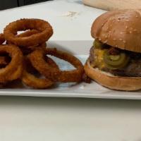 Chili Cheese Burger · Our ½ Lb. burger served with grilled onion, jalapenos, cheddar, topped with homemade chili.