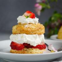 Old Fashioned Strawberry Shortcake · Tender, airy vanilla shortcake layered with sweet strawberry topping, real vanilla ice cream...