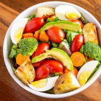 Chopped Salad · Mixed greens, avocado, tomatoes, onions, potatoes, seasonal vegetables, boiled egg, and toss...
