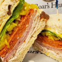 Mountain Man · Oven-roasted turkey, black forest ham, pepperoni, 3-pepper Colby jack cheese, banana peppers...