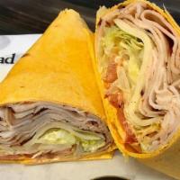 Spicer · Cajun turkey, lacey swiss, lettuce, tomato, and chipotle mayo in a jalapeño wrap