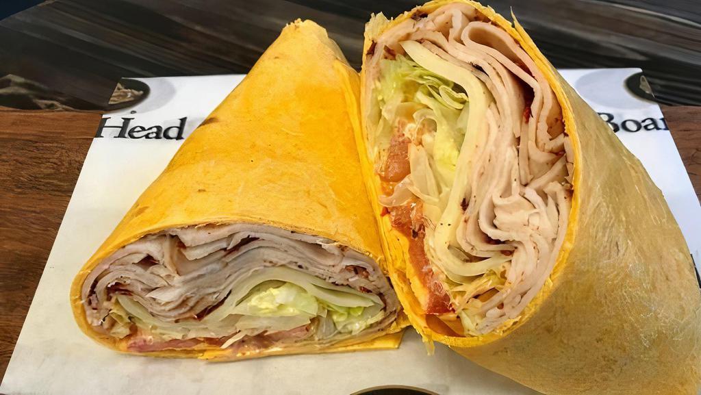 Spicer · Cajun turkey, lacey swiss, lettuce, tomato, and chipotle mayo in a jalapeño wrap