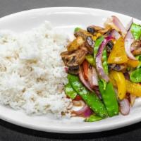 Thai Stir Fry · Stir-fried peppers, onions, mushrooms, snow peas and Thai chili sauce served with rice.