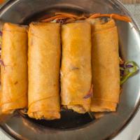Thai Spring Rolls (3) · Vegan. Crispy fried roll, stuffed with glass noodles, black mushrooms, cabbages and carrots....