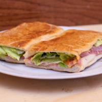 Ham & Cheese · Ham, American cheese, lettuce, tomato, and mayonnaise on foot long french bread.