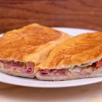 Italian · Ham, genoa salami, American cheese, lettuce, tomato, and mayonnaise on foot long french bread.