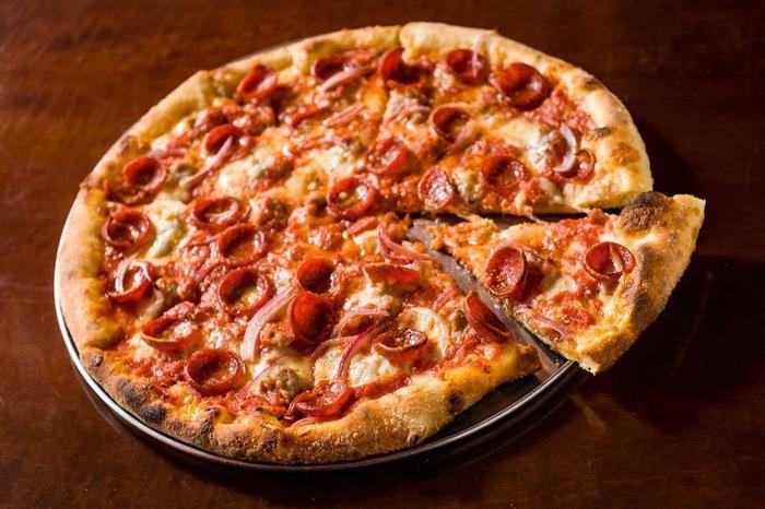 Calabrese · thick cut pepperoni, fennel sausage, red onions, mozzarella