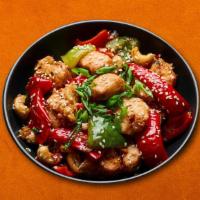 Chili Chicken Ching'S · A dish of Indo-Chinese origin, soft chicken cooked with garlic, bell peppers and onions in o...