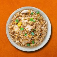 Chicken Fried Rice  · Long grain imported premium rice is stir fried in a wok with a selection of fresh vegetables...