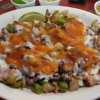 Enchilada Platter  · Two corn tortillas with choice of red or green sauce. Topped with onion, cilantro, queso fre...