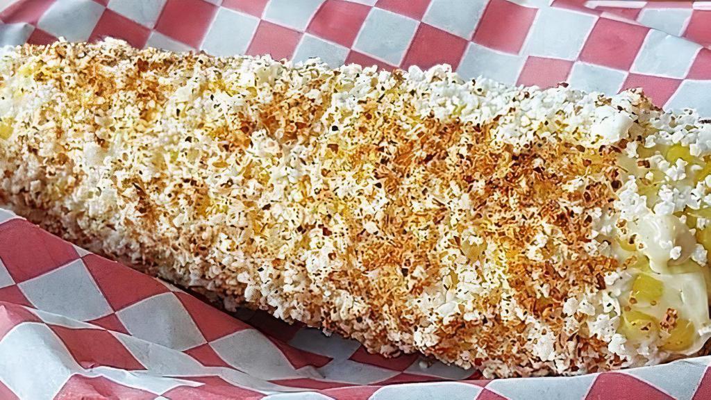Elotes  · Seasoned corn. Corn topped with mayo, queso fresco, and pepper seasoning. In a bowl.  Cob available in summer months.