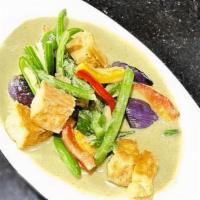 Green Curry · w/coconut milk, string beans, eggplant, sweet basil leaves, bamboo, finger. hot pepper &...