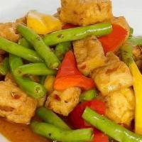 Pad Prik Khing · Stir- Fried Meat With Red Curry Paste, String Bean And Red, Yellow Bell Pepper.