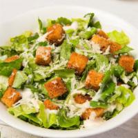 Chicken Caesar Salad · Crisp romaine lettuce tossed in Caesar dressing topped with chicken.