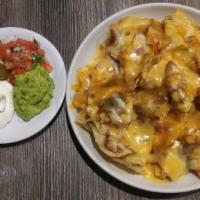 Nachos · traditional style nachos - Add chicken, beef, shrimp or bacon