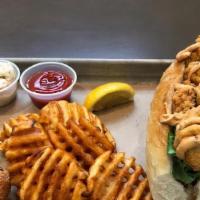 Shrimp Po Boy  · Served with Waffle Fries, Coleslaw & Hush Puppy.