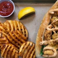 Oyster Po Boy  · Served with Waffle Fries, Coleslaw & Hush Puppy.