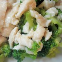 Chicken With Broccoli · Sautéed chicken served in white sauce, with broccoli.