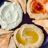 Combo Appetizer · Selection of three dips.
