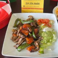Steak Or Chicken Fajita Dinner · Homemade corn or flour tortillas with steak or chicken, grilled onions, green peppers, and t...