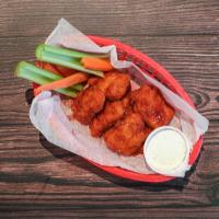 Wing Full Order · 1 lb (7-8) of jumbo mixed pieces, fried and tossed in your choice of sauce. Served on a bed ...