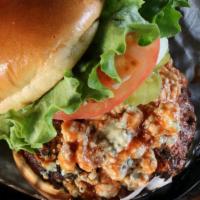 Black Buffalo Burger · 1/2 lb Angus Chuck patty spiked with Frank's Buffalo Sauce & blue cheese. Topped with green ...