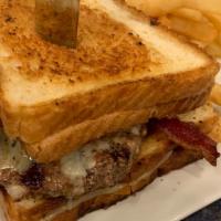 The Extreme Cheeseburger · Bet you can't finish it!  Fresh 8 oz certified Angus beef burger, bacon, cheese, between two...