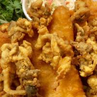 Fisherman'S Platter · Wild-caught beer battered haddock, clam strips, shrimp, scallops, served with tartar, colesl...