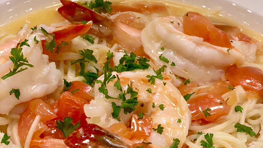 Shrimp Scampi · Jumbo shrimp, diced tomato, shallots, garlic butter, wine, Italian spices, over linguini
