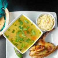 Sopa De Gallina India · Roasted chicken soup with vegetables, served with a roasted jalapeno and handmade tortillas.