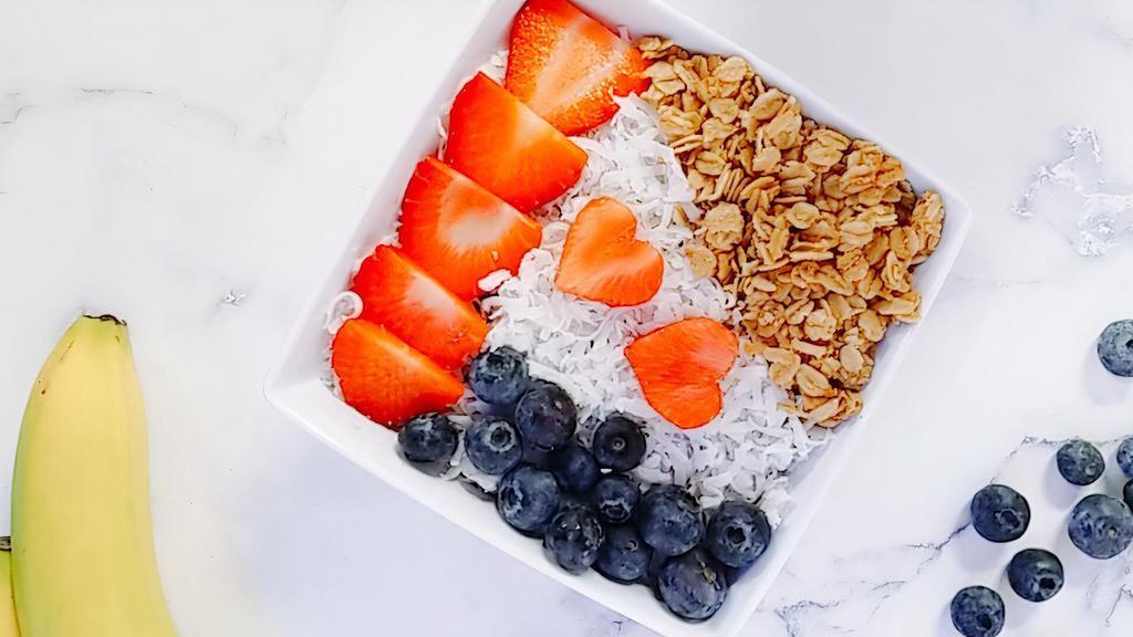 Revitalize Acai Bowl · Base: Coconut milk, pineapple, strawberries, blueberries, acai.
Toppings: Granola, strawberries, blueberries, coconut flakes, raw honey. *Please note: Additional toppings are an additional charge.