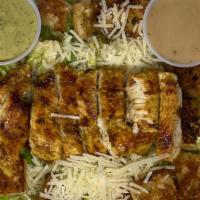 Chicken Caesar Salad · Grilled chicken breast, romaine lettuce, croutons fried in olive oil, Parmesan cheese, Caesa...