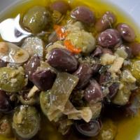 Roasted Olives · Roasted green and black olives with special mixture in olive oil. 16 oz container.