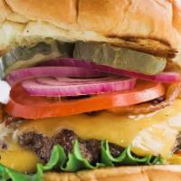 Original Kk Burger · Beef, or Lamb, Bun, American Cheese, Lettuce, Onion, Pickles, Tomato, Signature Sauce