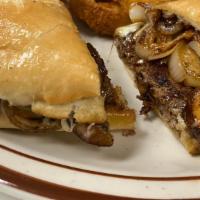 Burger Dip · Quarter pound patty, topped with sautéed mushrooms, grilled onions, and mozzarella cheese. O...