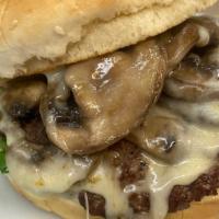 Mushroom Burger · Beef pattie, topped with sautéed mushrooms and pepper jack cheese, mayo, romaine lettuce, to...