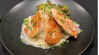 Gs Lemon Garlic Chicken · grilled chicken breasts, set atop buttermilk mashed potatoes & broccolini topped with lemon ...