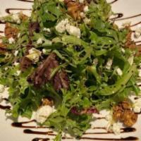 Gs Crave Starter Salad · Revol Greens spring mix tossed in tangy balsamic vinaigrette, topped with candied walnuts, g...