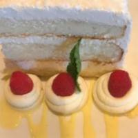 The Original Coconut Cake · made in house from our special recipe, served with vanilla anglaise & whipped cream