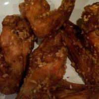 Garlic Chicken Wings · Four whole wings.
